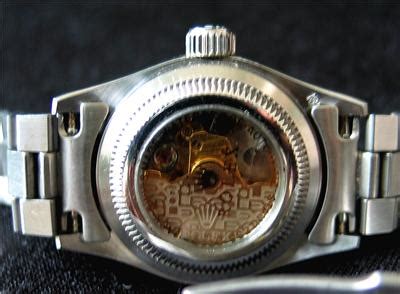 rolex watch with glass back